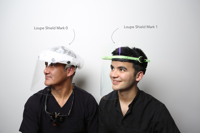 Dr. Scott Yamaoka wears the first version of the Loupe Shield and his son and co-inventor, Zach, wears the version that they are selling to dentists.