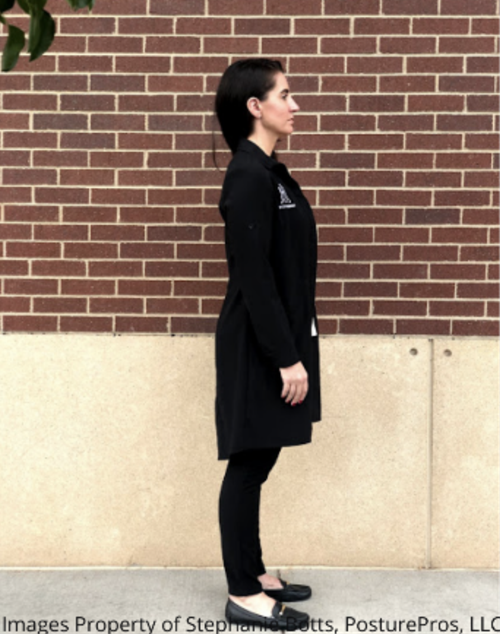 Profile view of a woman standing with straight posture